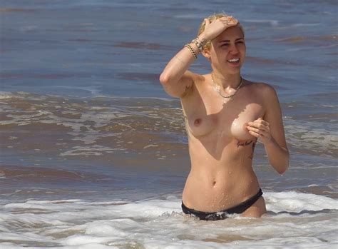 miley cyrus topless on the beach in hawaii 18 celebrity