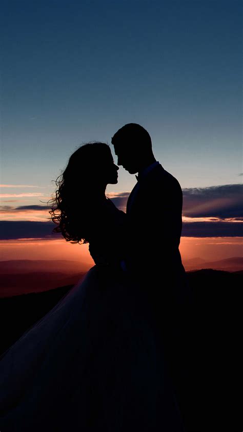 couple romantic sunset silhouette  ultra hd mobile wallpaper