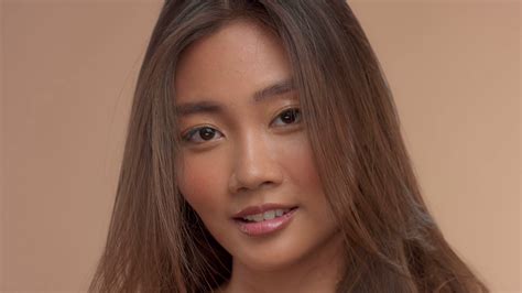 Closeup Portrait Of Thai Asian Model With Wet Eyelids Natural Makeup