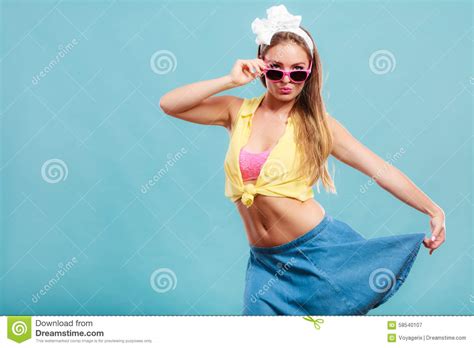Portrait Of Happy Pin Up Girl Wearing Sunglasses Stock