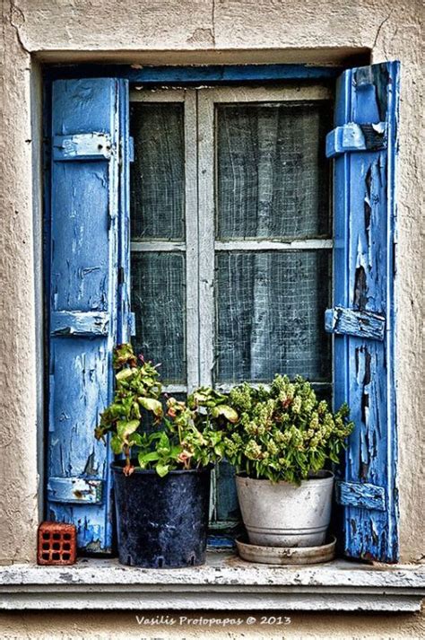 bellasecretgarden greek village house window via