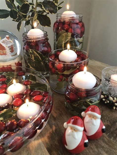 holly and cranberry centerpiece with candles for your