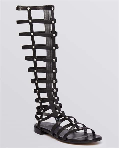 stuart weitzman leather gladiator knee high sandals in black lyst