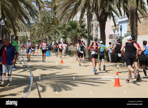 ironman barcelona  competitors hit  running    front  calella spain