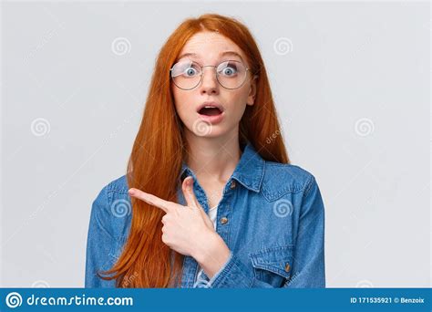 Surprised And Wondered Amused Attractive Redhead Woman In