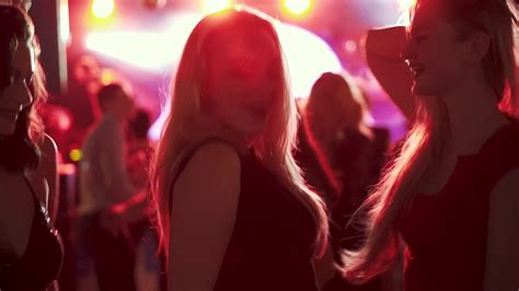 friends dancing  rays  red spotlights  stock footage sbv  storyblocks