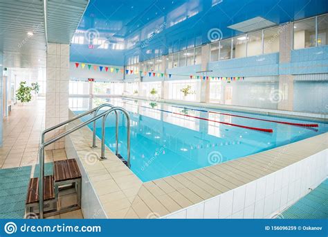 view  indoors swimming pool  metal ladder stock image image  indoor poolside