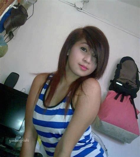 Beautiful Filipina Babe In A White And Blue Striped Shirt