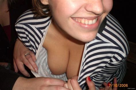 downblouse tits discreetly being shown by a naughty girl in public