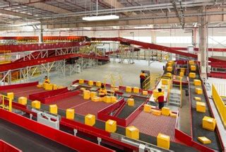 dhl begins constructing  biggest singapore warehouse portcalls asia