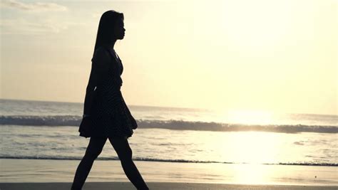 woman on the beach in sunset nude silhouette stock footage video