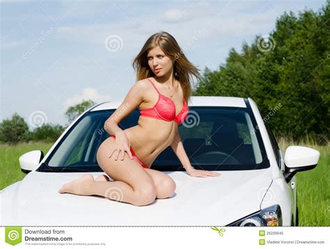 The Sexual Girl In Pink Bikini With White Car Royalty Free