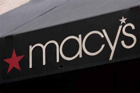 macys shares plunge  discounts eat  profits