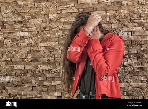 frightened teenage girl hiding face  hands stock photo alamy