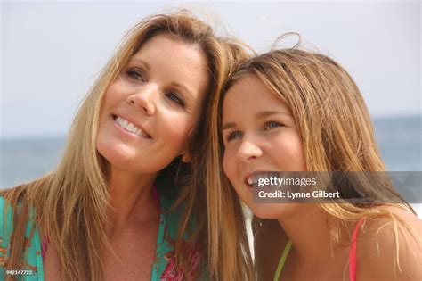 A Beautiful Mom And Daughter Enjoy The Beach In Malibu California High