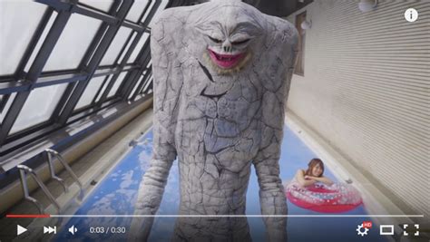 so a bikini model and a kaiju walk into japan s most famous porn location…to sell toys 【video
