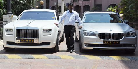 indian barber drives  rolls royce ghost  work sets