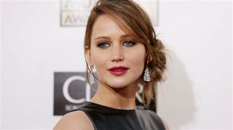 jennifer lawrence dating news rumors hunger games star to join coldplay s chris martin at