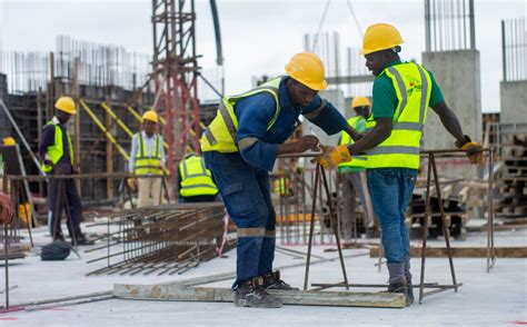 construction workers   building site  stock photo