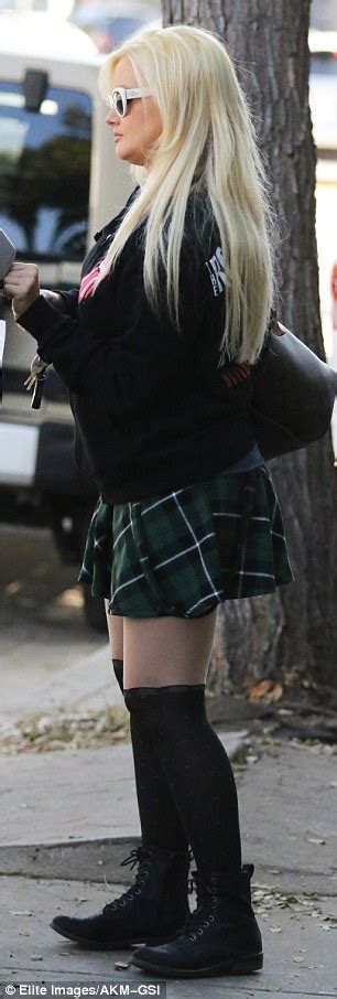 holly madison flashes skin in tiny school girl mini skirt and sheer knee high socks daily mail