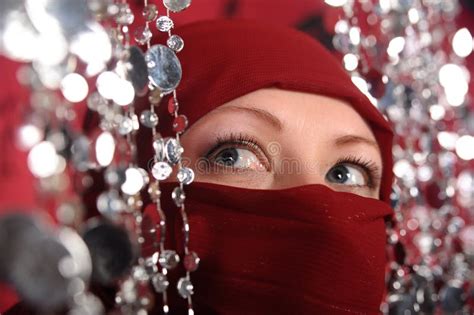 woman covering face hijab   royalty  stock