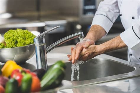 cropped image  chef washing hands  restaurant kitchen easy food