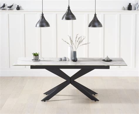 odessa   white ceramic extending dining table  black legs
