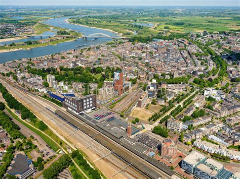 aerophotostock stationsgebied en station nijmegen luchtfoto met links het keizer karelplein