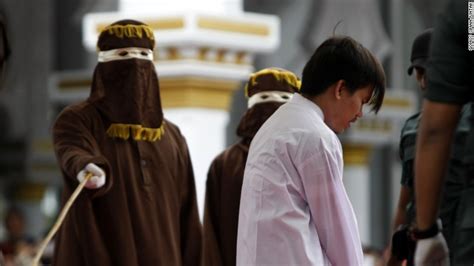 two men caned 83 times in indonesia for homosexual sex