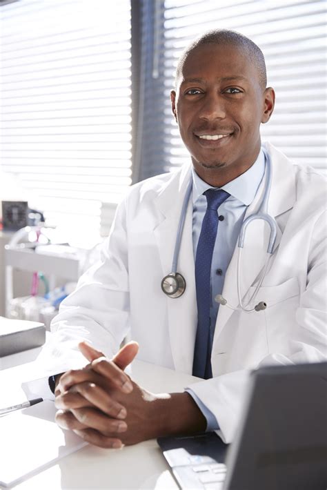 portrait  smiling male doctor wearing white coat  stethoscope