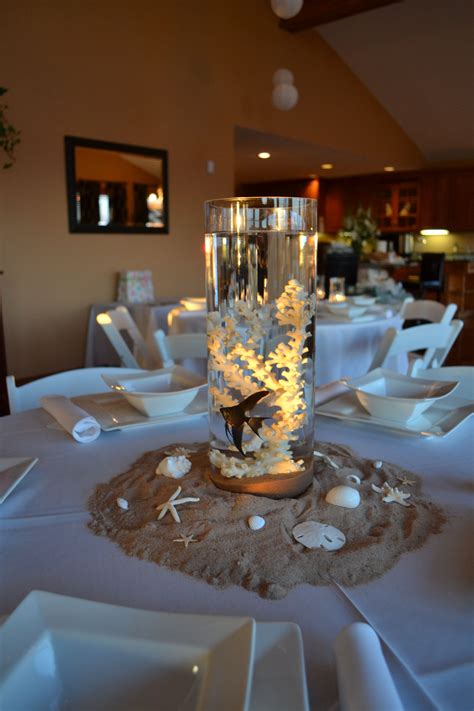 centerpieces  beach themed baby shower  real fish  floating