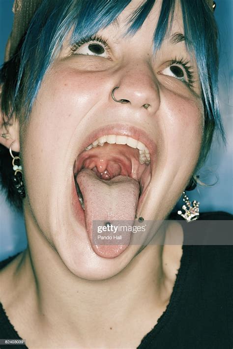 Punk Woman Sticking Out Tongue Portrait Photo Getty Images