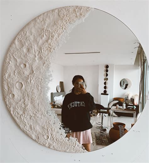 this moon inspired mirror creates your home s perfect mirror selfie