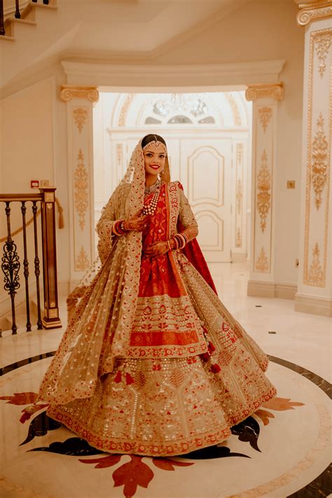 a royal destination wedding with the bride in a stunning red and white