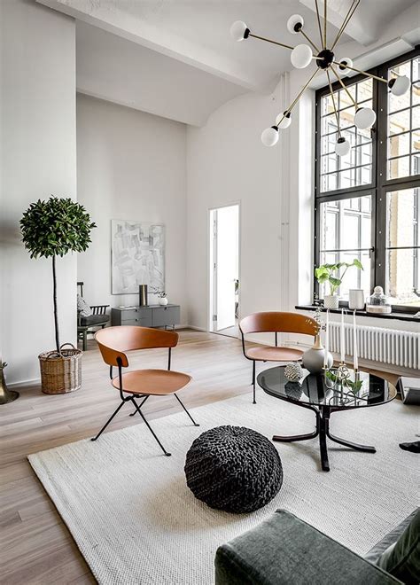 stunning stockholm apartment in a converted brewery stockholm apartment living room decor