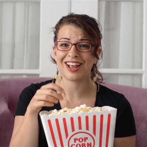 eating popcorn find and share on giphy