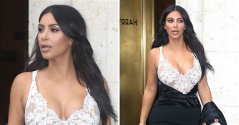 kim kardashian flaunts mega cleavage in sheer lace dress is she even