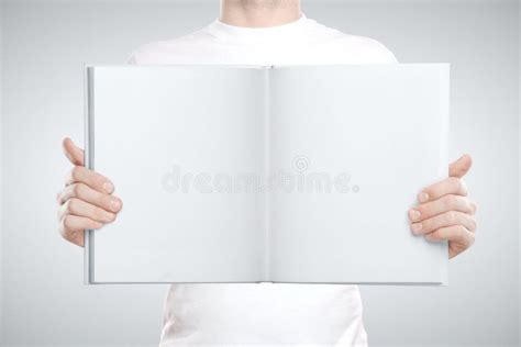 man holding blank book  hand stock image image  object closeup