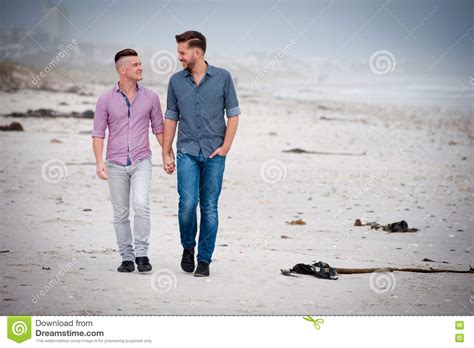 Gay Couple Walking Holding Hands Stock Image Image Of