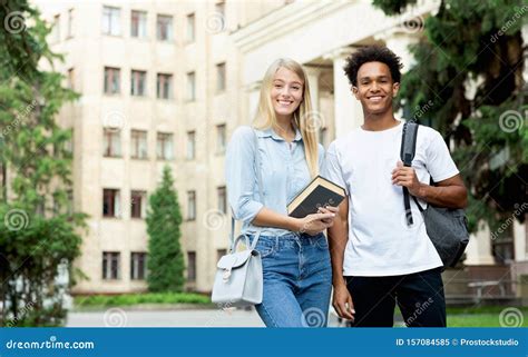 college students teens posing  camera  campus stock image image  communication diverse