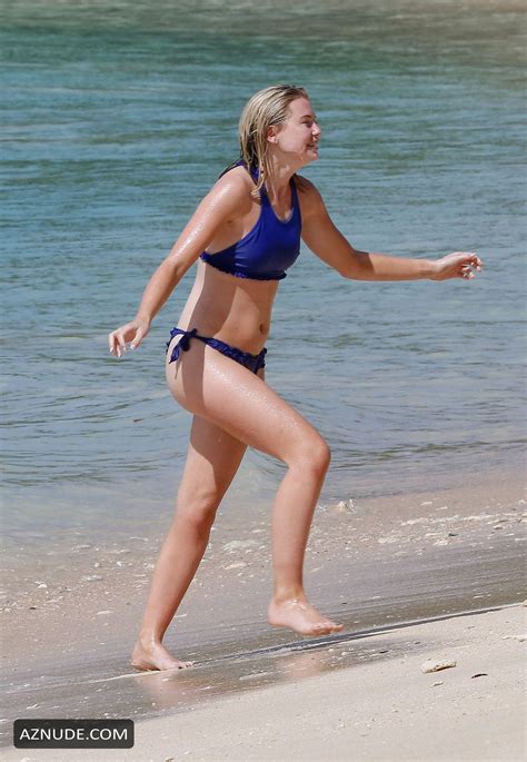 georgia toffolo sexy on the beach in a tiny blue bikini while on