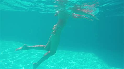pretty girl in bikini swimming in the pool underwater stock footage video 6549527 shutterstock