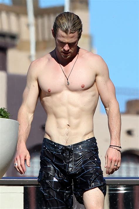 32 pictures proving chris hemsworth is actually a god