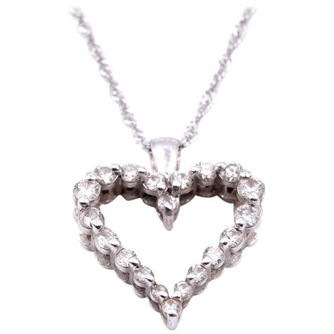 14 karat white gold heart with diamond necklace for sale at 1stdibs