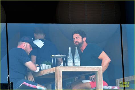 gerard butler shows his barefoot confidence at sydney bondi beach lunch