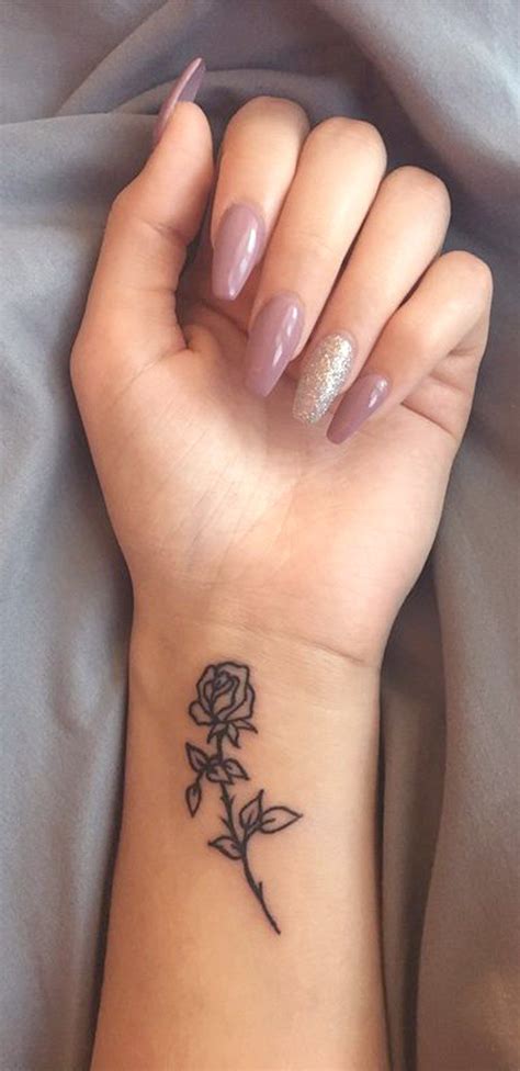 small rose wrist tattoo ideas  women minimal flower