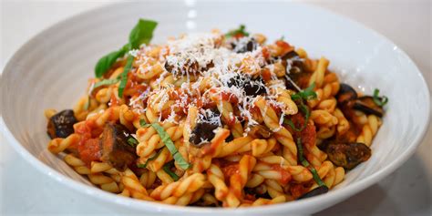 make sicilian style pasta with roasted eggplant and fresh tomato sauce