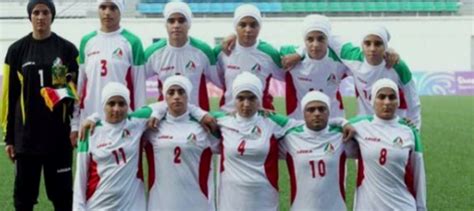iranian women s soccer under fire for having men posing as