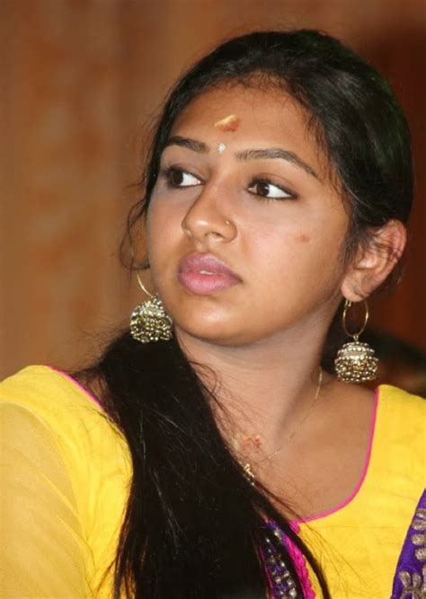 Cute Actress Lakshmi Menon Latest Stills In Yellow Tamil
