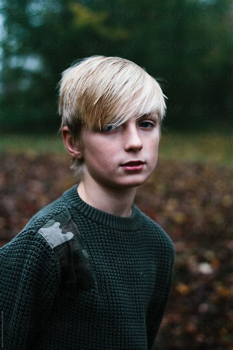 portrait   teenage boy outdoors  stocksy contributor helen